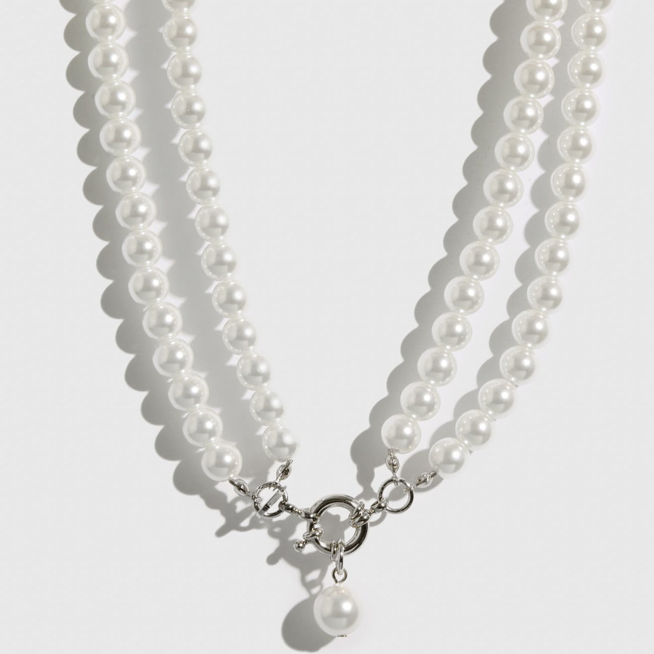 Silver plated Renaissance pearls choker with pearls, shown on a plain background.
