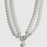 Silver plated Renaissance pearls choker with pearls, shown on a plain background.