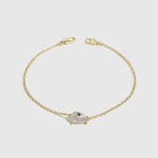14k gold plated sterling silver 925 regular teardrop-cut solitaire bracelet with a pure white cubic zirconia, shown on a plain background.