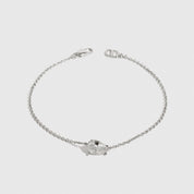 Sterling silver 925 regular teardrop-cut solitaire bracelet with a pure white cubic zirconia, shown on a plain background.