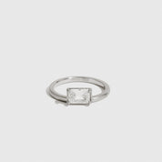 Sterling silver 925 baguette-cut solitaire ring with a baguette-cut cubic zirconia, shown on a plain background.