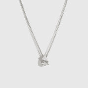 Sterling silver 925 regular teardrop-cut solitaire necklace with a pure white cubic zirconia, shown on a plain background.