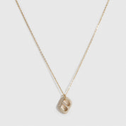 14k gold plated sterling silver 925 pavé monogram pendant necklace with cubic zirconia, shown on a plain background.