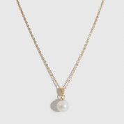 14k gold plated sterling silver 925 solitaire pearl pendant necklace with a cultured freshwater pearl, shown on a plain background.