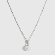 Sterling silver 925 solitaire pearl pendant necklace with a cultured freshwater pearl, shown on a plain background.