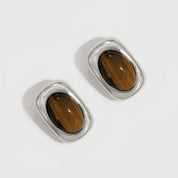 Silver plated tiger eye stud earrings, shown on a plain background.