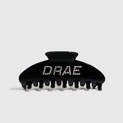 Black acetate hair claw, style 1, shown on a plain background.