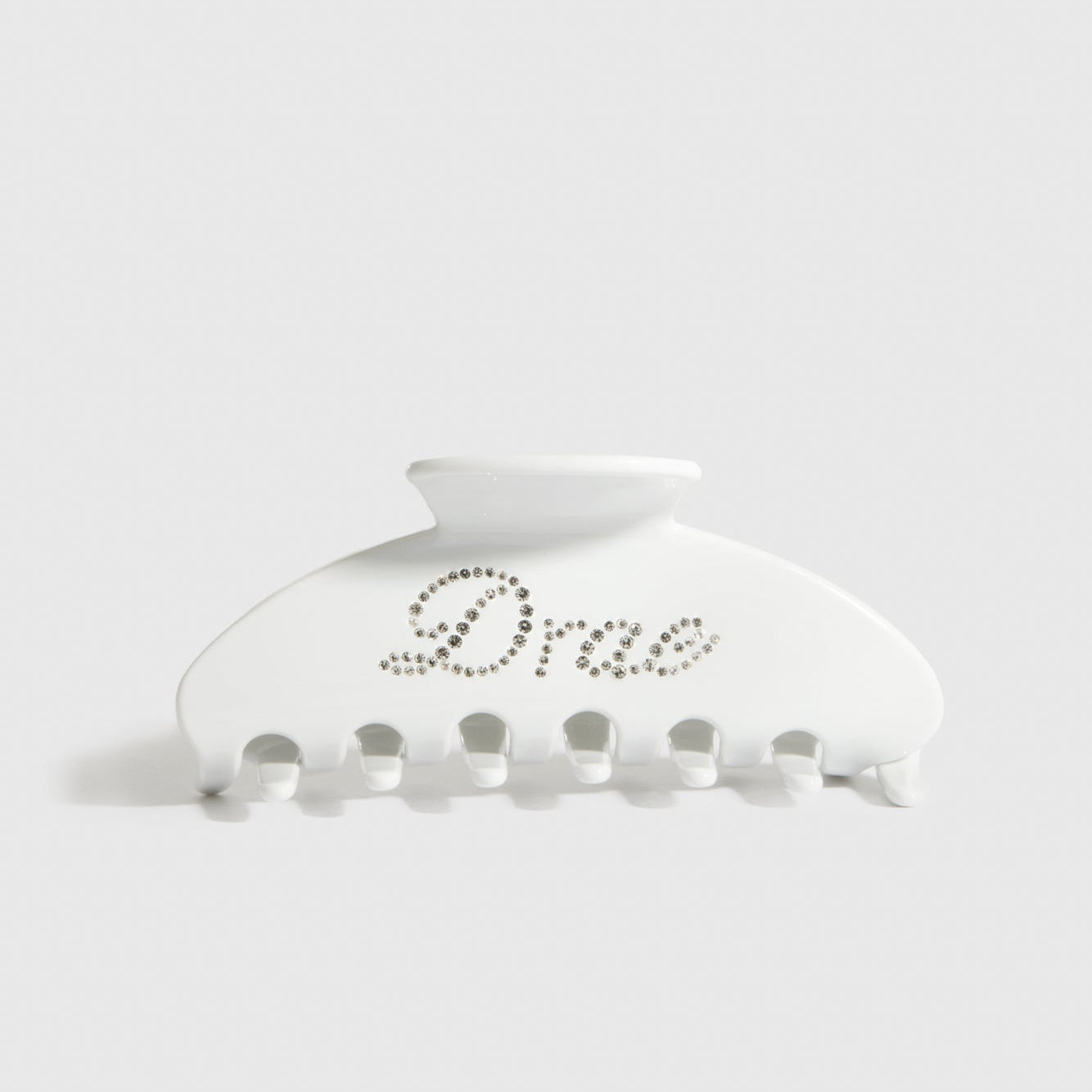 White acetate hair claw, shown on a plain background.