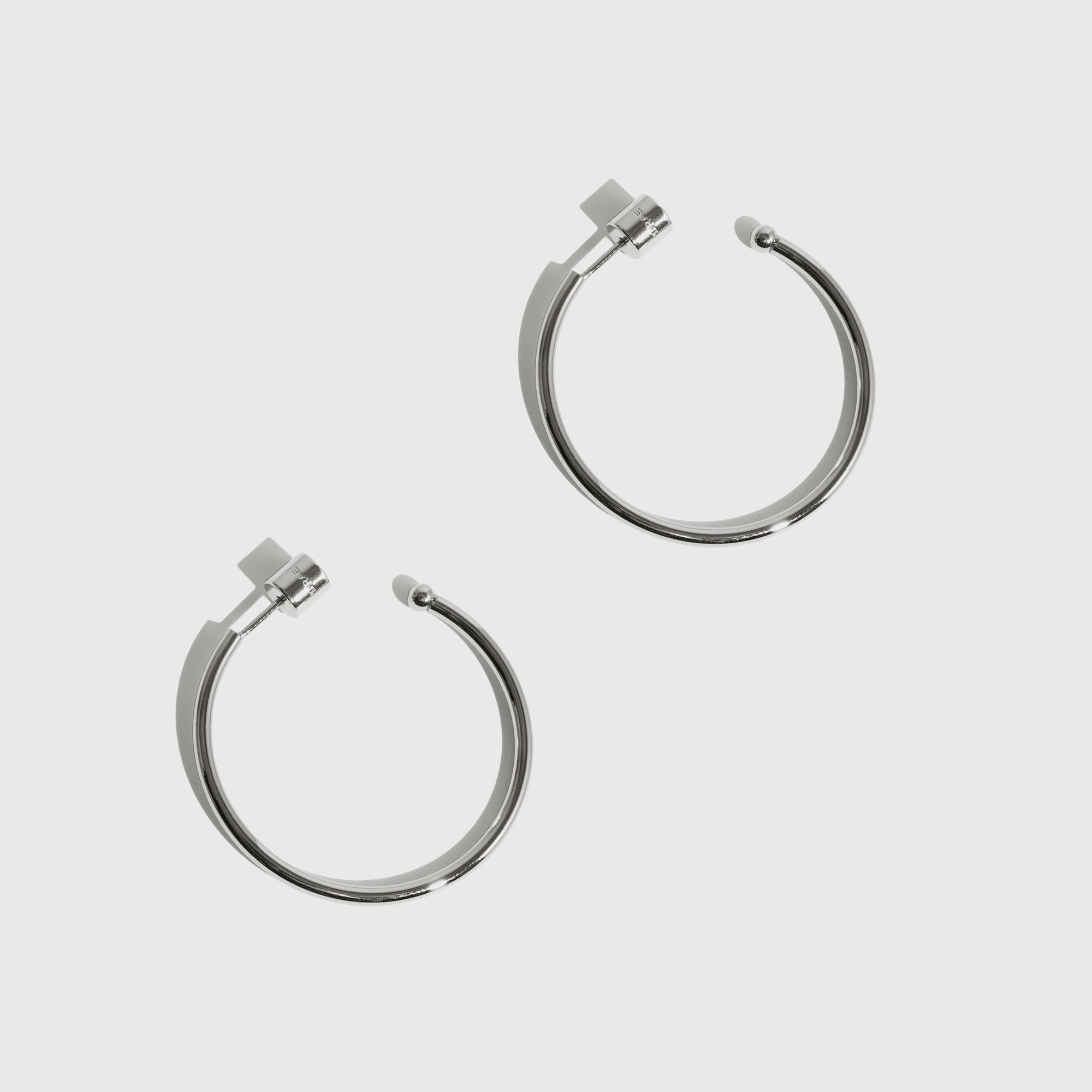 Silver plated small Hazel hoop earrings, shown on a plain background.