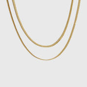 14k gold plated layered necklace, shown on a plain background.