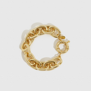 14k gold plated stellar bracelet, shown on a plain background.