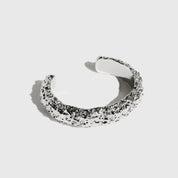 Silver thick nugget cuff bracelet with a textured finish, shown on a plain background.