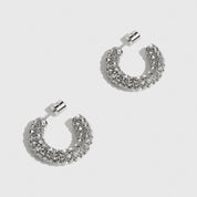 Silver plated extra bold hoop earrings with cubic zirconia, shown on a plain background.
