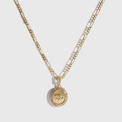 14k gold plated sterling silver 925 evil eye necklace with cubic zirconia, shown on a plain background.